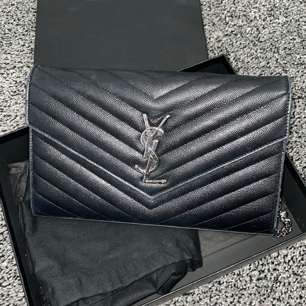 YSL black envelope bag.